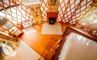 Living space in yurt at Strawhouse Resorts
