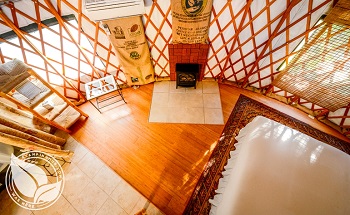 Living space in yurt at Strawhouse Resorts